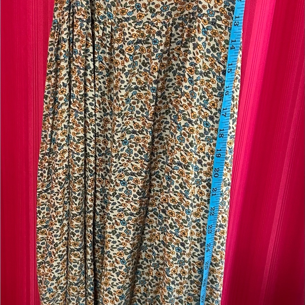 Natural Life Floral jumpsuit with Blue and Yellow Accents